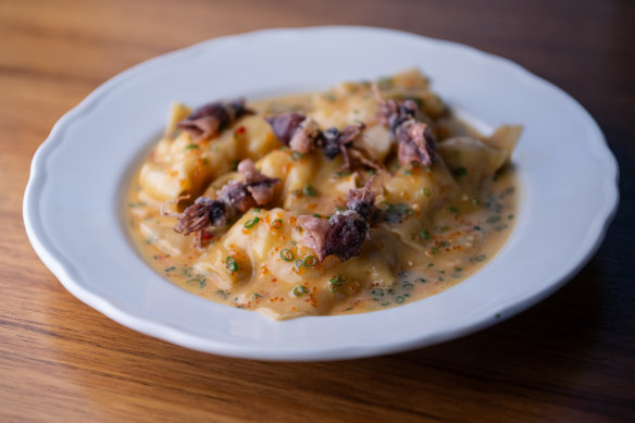 Go-to dish: Hokkaido scallop and prawn ravioli under a rich and buttery sauce strewn with spanner crab meat.