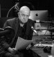 John Silvester recording an episode of his Naked City podcast.