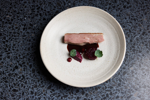 Aged duck with red cabbage marmalade, salt-baked beetroot and raspberry coulis. 