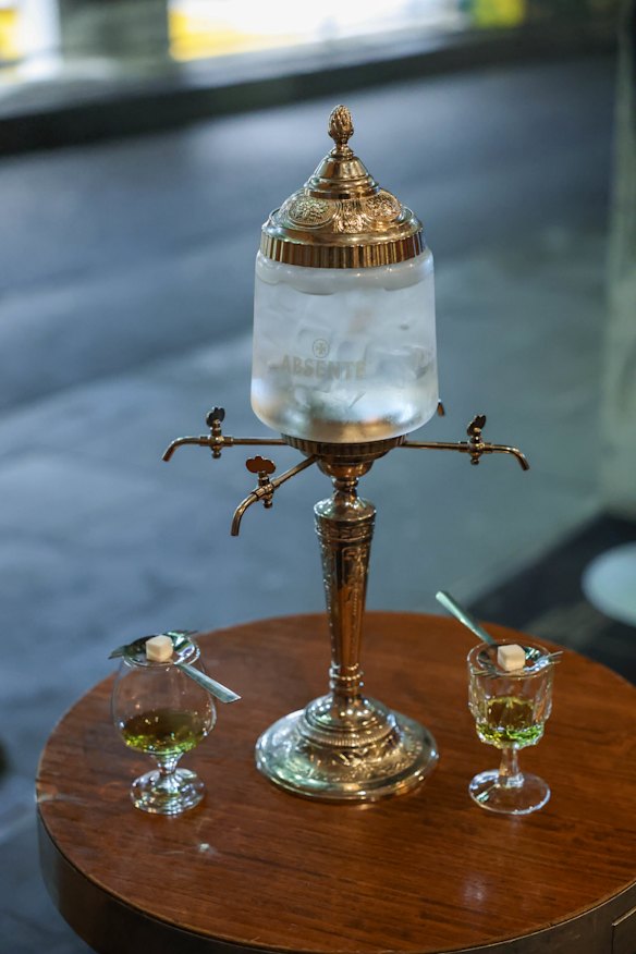Drinkers can dilute their absinthe with drops from an ornate water fountain.