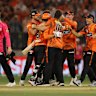 Scorchers celebrate their win.