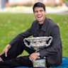 Men’s singles champion Carlos Alcaraz poses at Carlton Gardens on Monday after his victory over Novak Djokovic the night before.