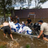 Residents ship sandbags in Echuca, one of many towns battling floods across Australia in the past week.