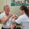 Queensland Health Minister Tim Nicholls received his flu vaccination on Tuesday before announcing an expansion of the state’s needle-free flu mist program. 