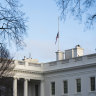 The flag above the White House is lowered to half-mast.