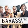 The Barassi family pose with a Barassi Way street sign on Friday.