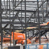 The collapsed roof of the Kew Recreation Centre in inner-eastern Melbourne’s Kew in 2022. The local council has not yet confirmed a budget to complete the project delayed by 20 months.