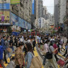 Hong Kong plots a different COVID path to China’s zero tolerance