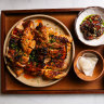 Chicken inasal is marinated in calamansi, ginger, garlic, lemongrass and spiced coconut vinegar.
