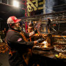 Adam Roberts doing a demonstration at Vivid Fire Kitchen.