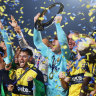 GOSFORD, AUSTRALIA - MAY 25: Danny Vukovic of the Central Coast Mariners holds aloft the Championship Trophy alongside team mates after winning the A-League Men Grand Final match between Central Coast Mariners and Melbourne Victory at Industree Group Stadium, on May 25, 2024, in Gosford, Australia. (Photo by Mark Metcalfe/Getty Images)