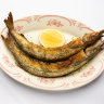 Whole garfish with lemon.