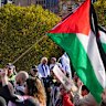 Pro-Palestine protestors march through the streets of Melbourne on Sunday.