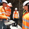 Cross River Rail boss Graeme Newton briefs state and federal MPs, including then acting premier Steven Miles. The $6.3 billion mega project is one of many on the government’s growing books.