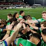 The Raiders take a moment after their victory in Mudgee.
