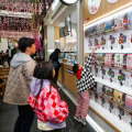 A wall of vending machines at Gacha Cafe.