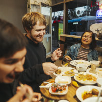 Sharing a Filipino feast at Let’s Chon.