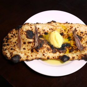 Wood-fired garlic flatbread.