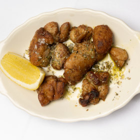 Kafeneion’s sweetbreads served with lemon for squeezing.