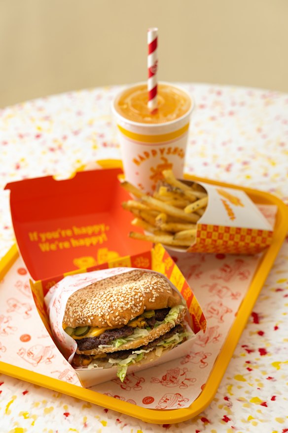 The BIG Happy burger with fries.