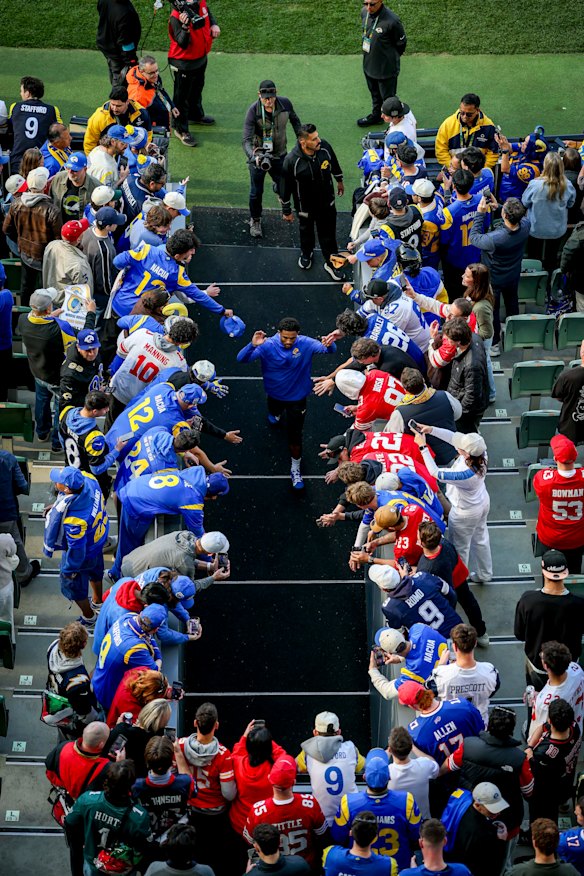 Fans at the NFL game between the LA Rams and San Francisco 49ers at the MCG.
