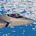 A Danish Air Force F-35 aircraft patrols over the east coast of Greenland.