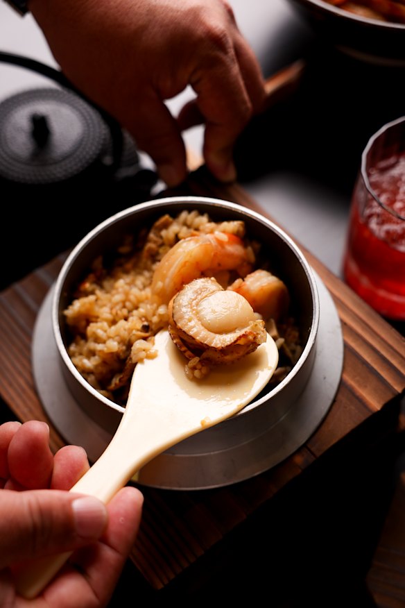 Seafood kamameshi with umami soup. 