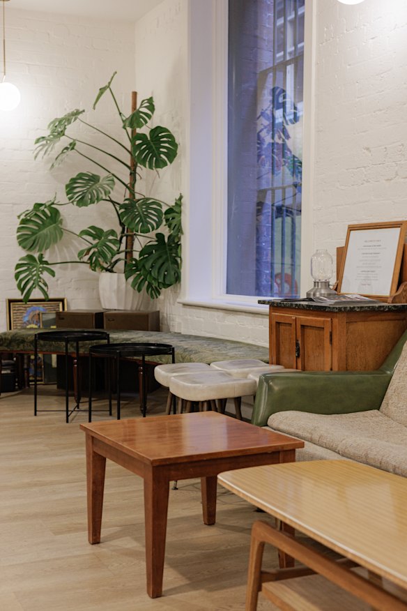 The space is fitted out with vintage furniture.