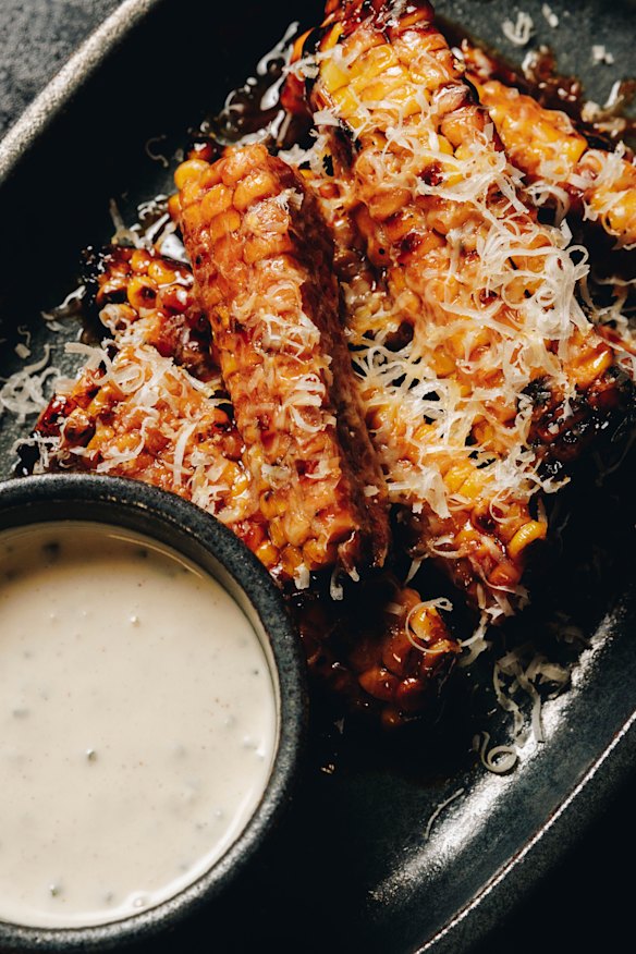Corn ribs with buffalo sauce and Manchego cheese. 