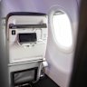 Seatbacks have a built-in device holder.