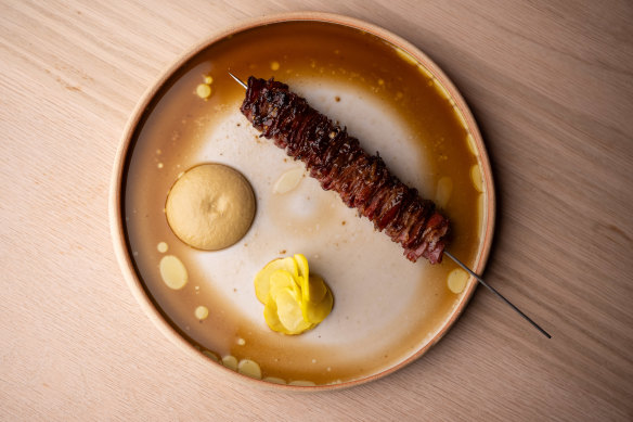 Grilled wagyu rib-cap skewer.