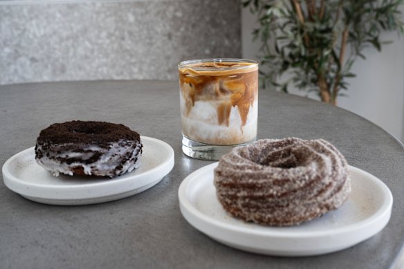 A pair of French crullers and an iced coffee.