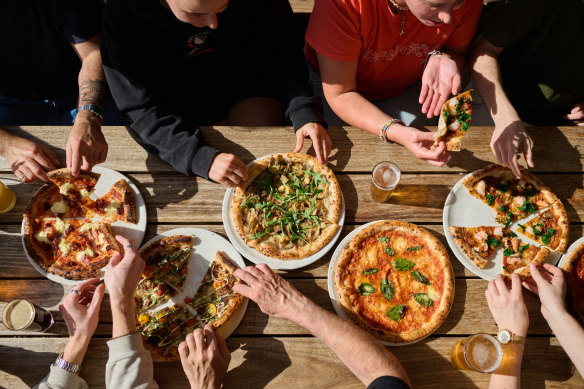 Stomping Ground has plenty of space for big crowds taking advantage of their weekly pizza night.
