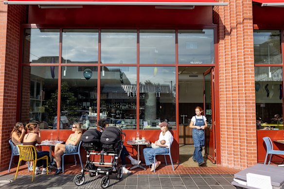 The cafe is housed at the base of an apartment building.