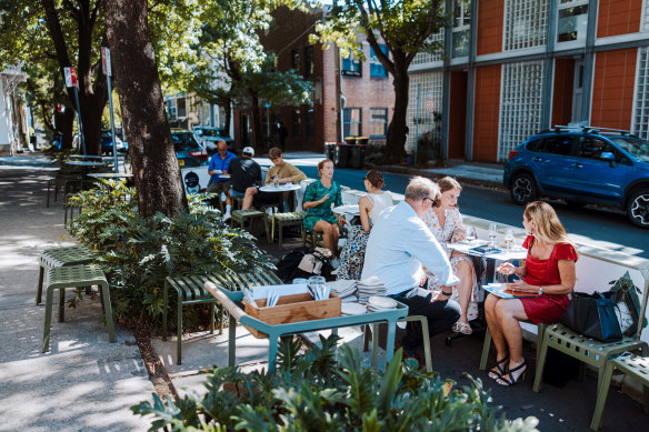 Take a seat outside and order the fish sandwich for dinner. 