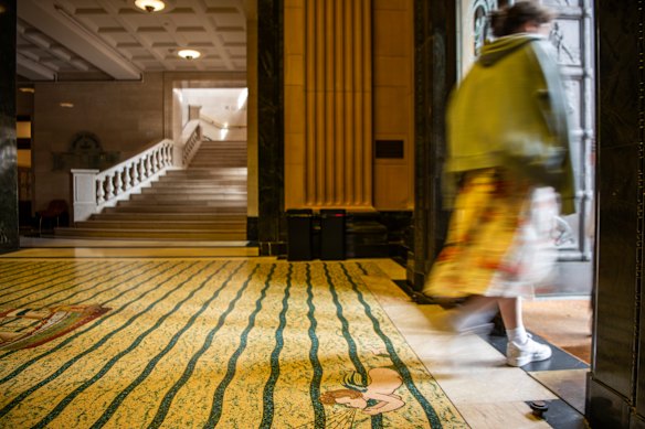 The State Library of NSW’s bronze doors (right) get little attention, but hold distressing secrets.