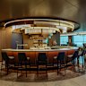 The Signature Bar features 12 seats and full-service bar facilities.