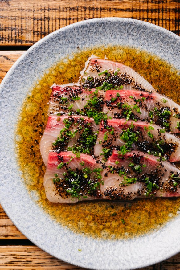 Kingfish with aged ponzu, kombu, chives.