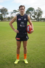 Will Setterfield in the Blues orange socks they will wear for the "Carlton Respects" round. 