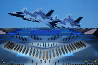The Chinese military featured prominently in 2021’s Community Party centenary in a year when Beijing flew a record number of test flights over the Taiwan Strait and also parked dozens of vessels in a disputed archipelago in the South China Sea. 