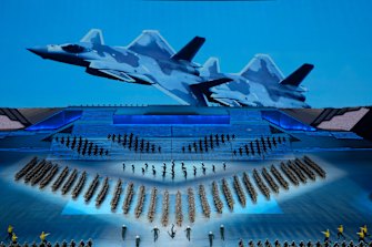 The Chinese military featured prominently in 2021’s Community Party centenary in a year when Beijing flew a record number of test flights over the Taiwan Strait and also parked dozens of vessels in a disputed archipelago in the South China Sea. 