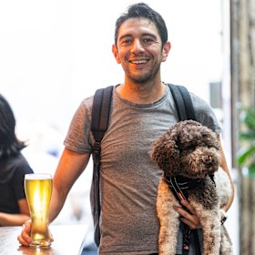 Nthside Collective community run club member Oliver Herrera after a jog with his dog, Chela.