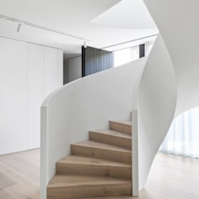 The sculptural spiral staircase.