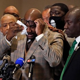George Floyd’s brother, Philonise Floyd, wipes his eyes during a news conference after the verdict. 