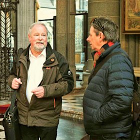 Martial Masschelein, left, with Fairfax writer Tony Wright, in the reconstructed Ypres Cathedral