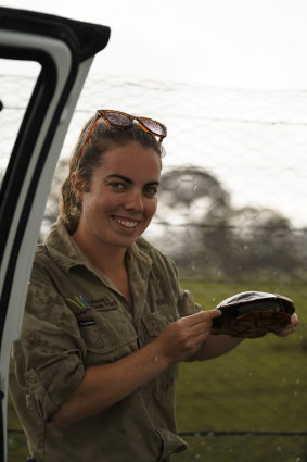 Woodlands and Wetlands Trust Indigenous project officer Kristi Lee with an eastern long neck turtle.