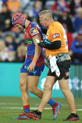Kalyn Ponga leaves the field against the Sharks in round 26.
