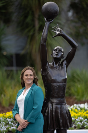 Sharelle McMahon with a bronze statue of herself unveiled at John Caine Arena on International Women’s Day 2023. 