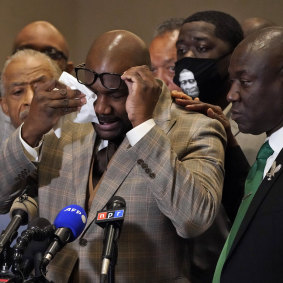 George Floyd’s brother, Philonise Floyd, wipes his eyes during a news conference after the verdict. 