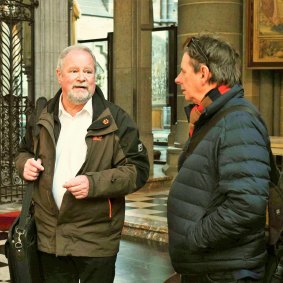 Martial Masschelein, left, with Fairfax writer Tony Wright, in the reconstructed Ypres Cathedral